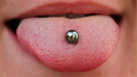 tongue ring bar|tongue piercing healing stages.